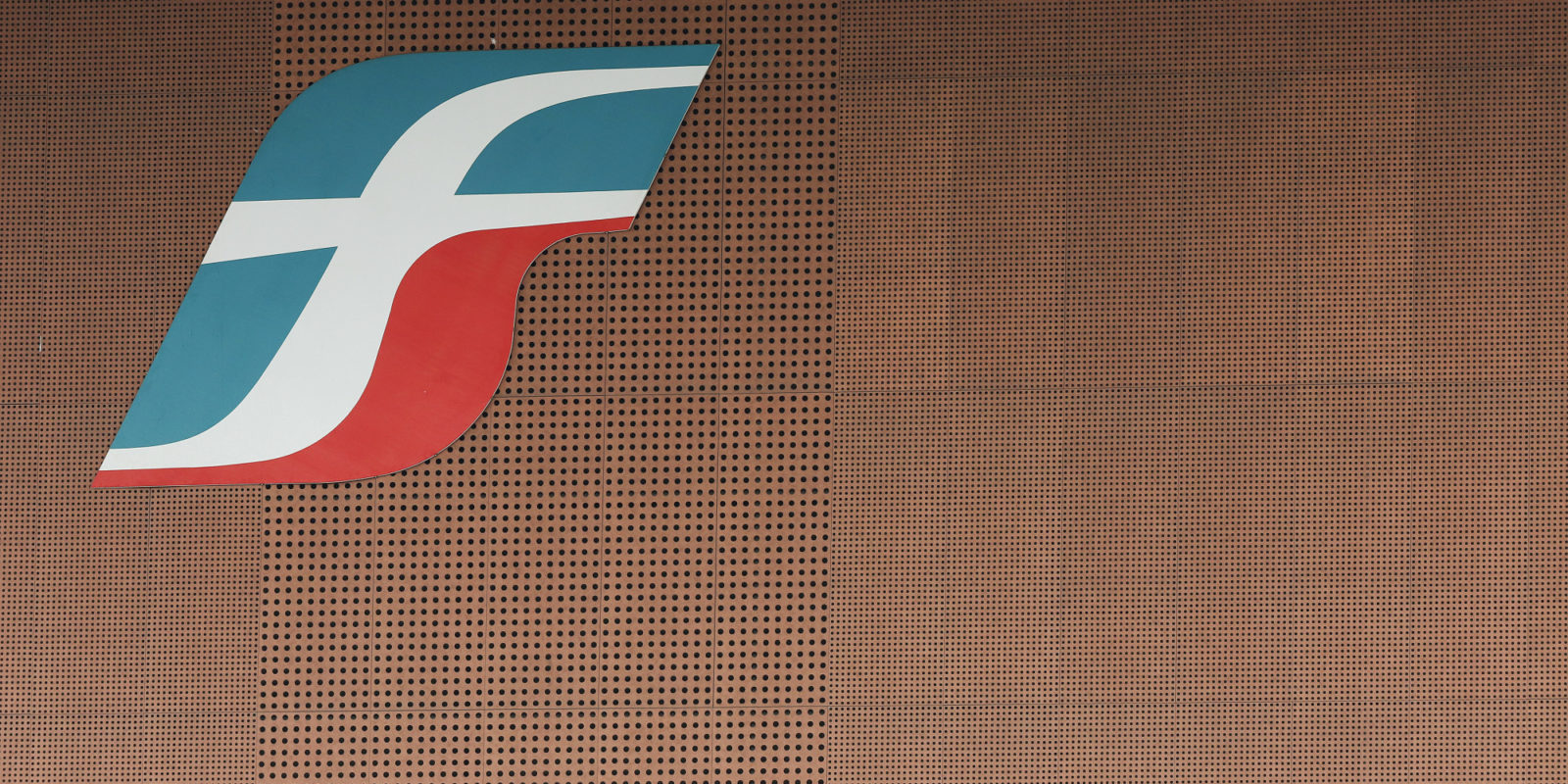 A logo of Italian state railways "Ferrovie dello Stato" is seen at the Tiburtina rail station in Rome, Italy, April 1, 2016.   REUTERS/Alessandro Bianchi