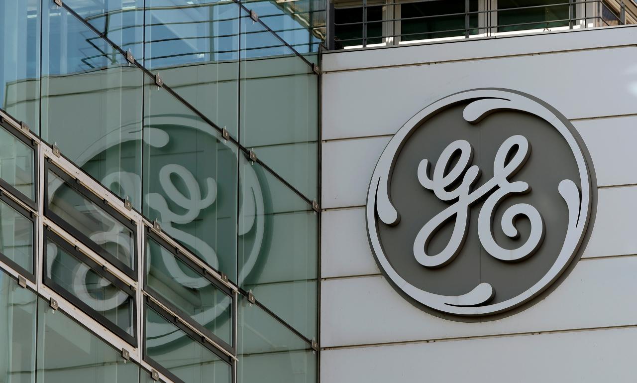 FILE PHOTO: The logo of General Electric is seen at its plant in Baden, Switzerland November 15, 2017. REUTERS/Arnd Wiegmann/File Photo