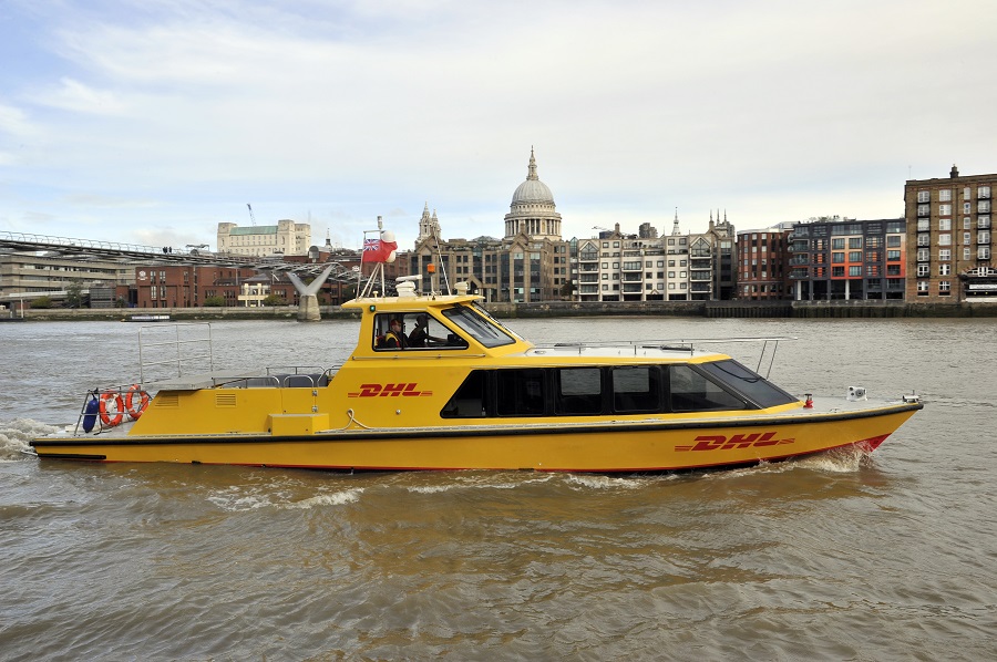 Daily DHL boat on River Thames replaces transfers via trucks, transporting small packages into central London for last mile delivery by bike.