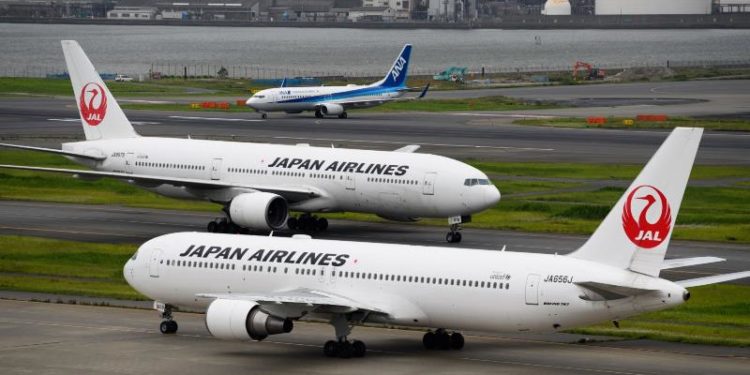 Aircrafts taxi at Haneda Airport in Tokyo, Japan, on Tuesday, May 28, 2019. Photographer: Akio Kon/Bloomberg