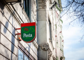 Picture of a sign with the logo of Magyar Posta on one of their post offices in Budapest, Hungary. Magyar Posta Zrt. or Hungarian Post is the postal administration of Hungary. Besides normal mail delivery, Magyar Posta also offers logistics, banking, and marketing services.